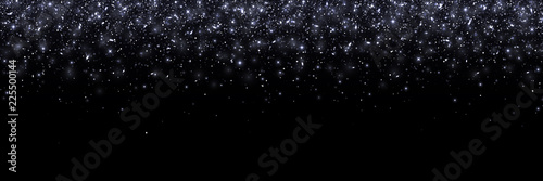 Black falling particles on black background, wide banner. Vector