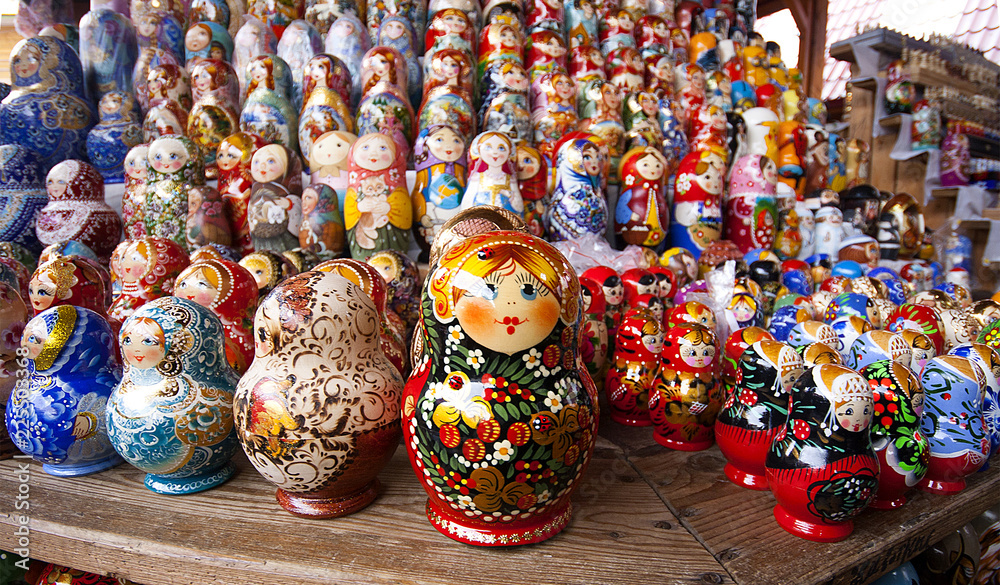 Matryoshkas with miniature painting (nested doll) at the flea market Izmailovo. Moscow, Russia. March, 2017 Matryoshkas with miniature painting (nested doll) at the flea market Izmailovo. Moscow, Russia. March, 2017