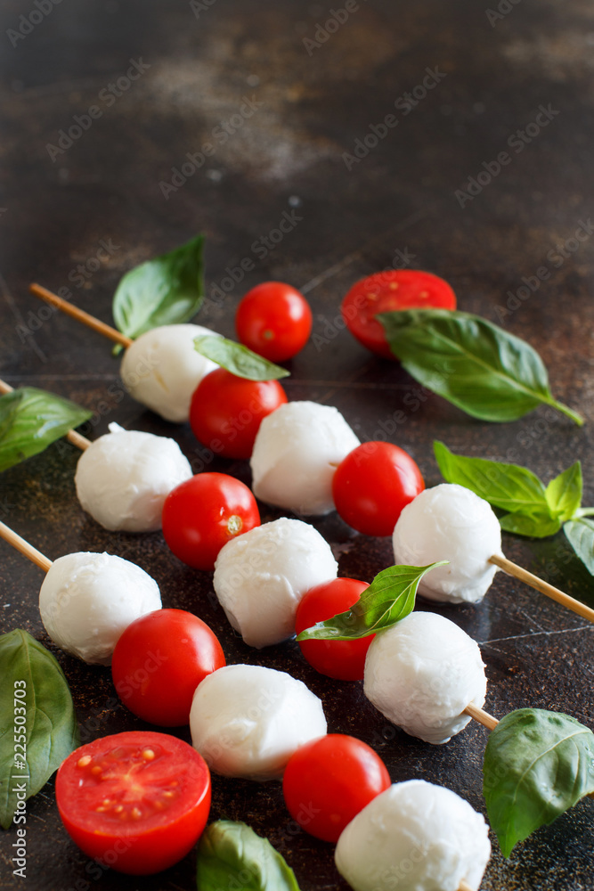Italian cheese mozzarella with tomatoes and basil Italian cheese mozzarella with tomatoes and basil