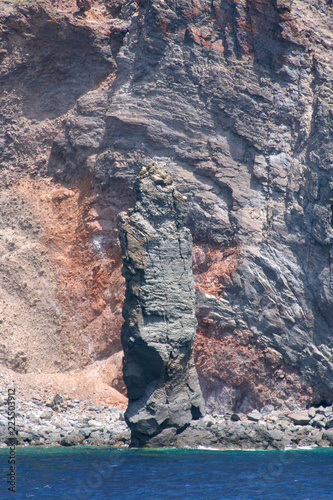 Famous Guard Rock and surf on the Lipary island, Sicilia, Italy.