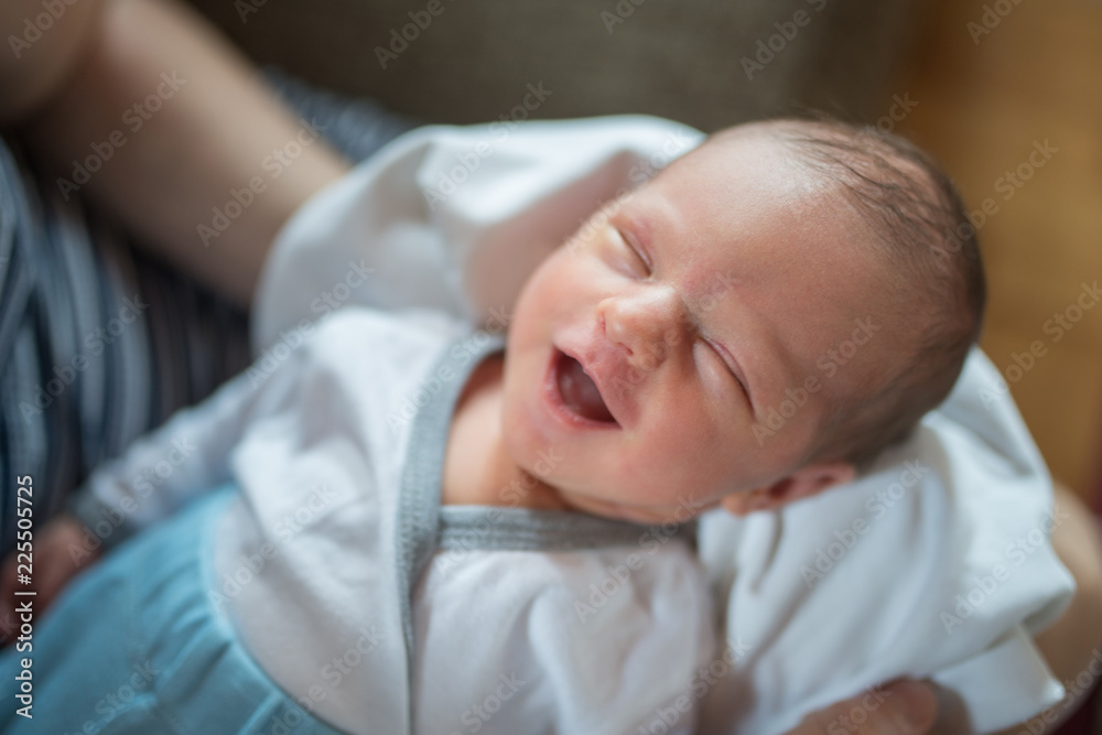 Close up portrait of smiling newborn baby girl Close up portrait of smiling newborn baby girl