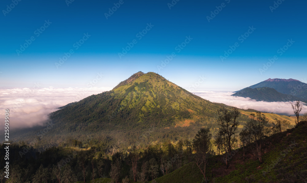 Natural Landscape Scenery View of Mountain Peak and Forest at Sunrise, Mountains Range Summit and Environment Freshness Scenic in The Mist. Nature Park/Outdoors Photograph Natural Landscape Scenery View of Mountain Peak and Forest at Sunrise, Mountains Range Summit and Environment Freshness Scenic in The Mist. Nature Park/Outdoors Photograph