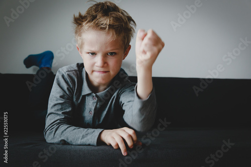 agressive angry conflict boy stress bullying, prepare to fight photo
