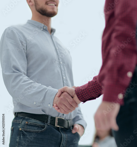 Business people shaking hands in modern conference office. © ASDF
