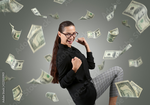 Happy rich woman with falli...