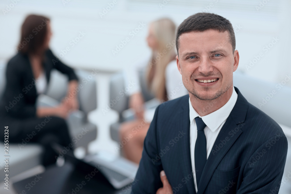successful businessman on blurred background office