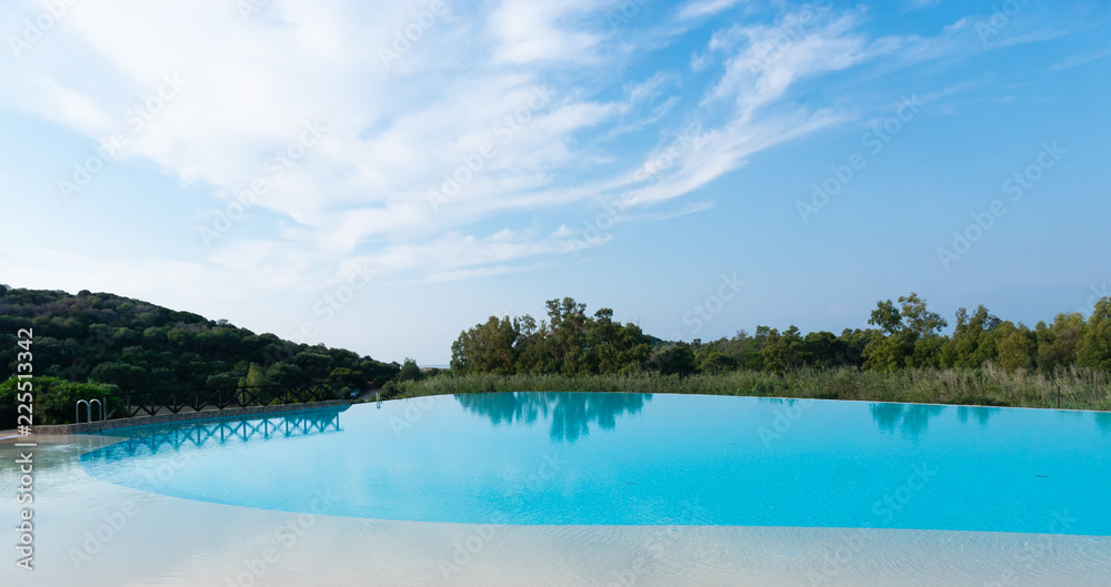 Swimming pool near sea, Sardinia, Italy

