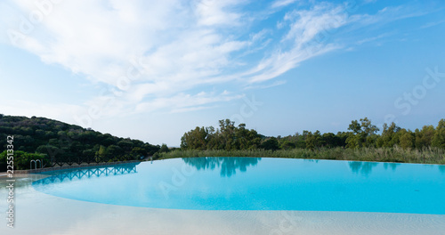 Swimming pool near sea, Sardinia, Italy 