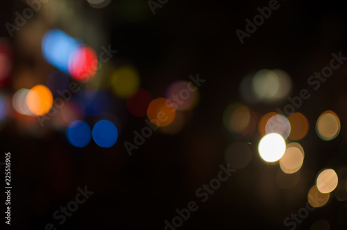 Abstract city night defocused light, blur bokeh, colorful & dark background. Dreamy, shiny, urban & backdrop. © BentChang