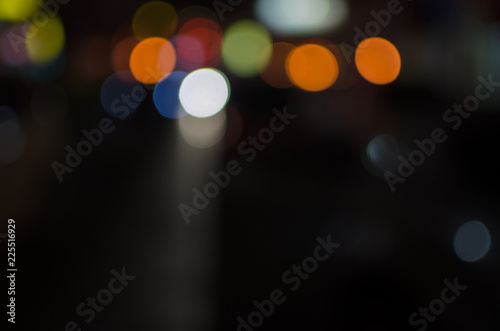Abstract city night defocused light, blur bokeh, colorful & dark background. Street, backdrop, dreamy & artistic. © BentChang