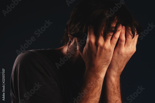 Canvas Print Man is crying in despair