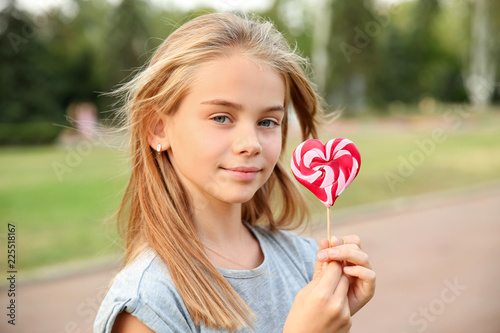 Cute little girl with heart...