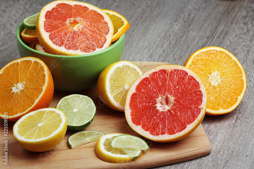 Fototapeta Naklejka Na Ścianę i Meble -  Mix of citrus fruits cut in different forms