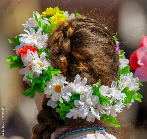 Wreath of flowers on the head of a girl