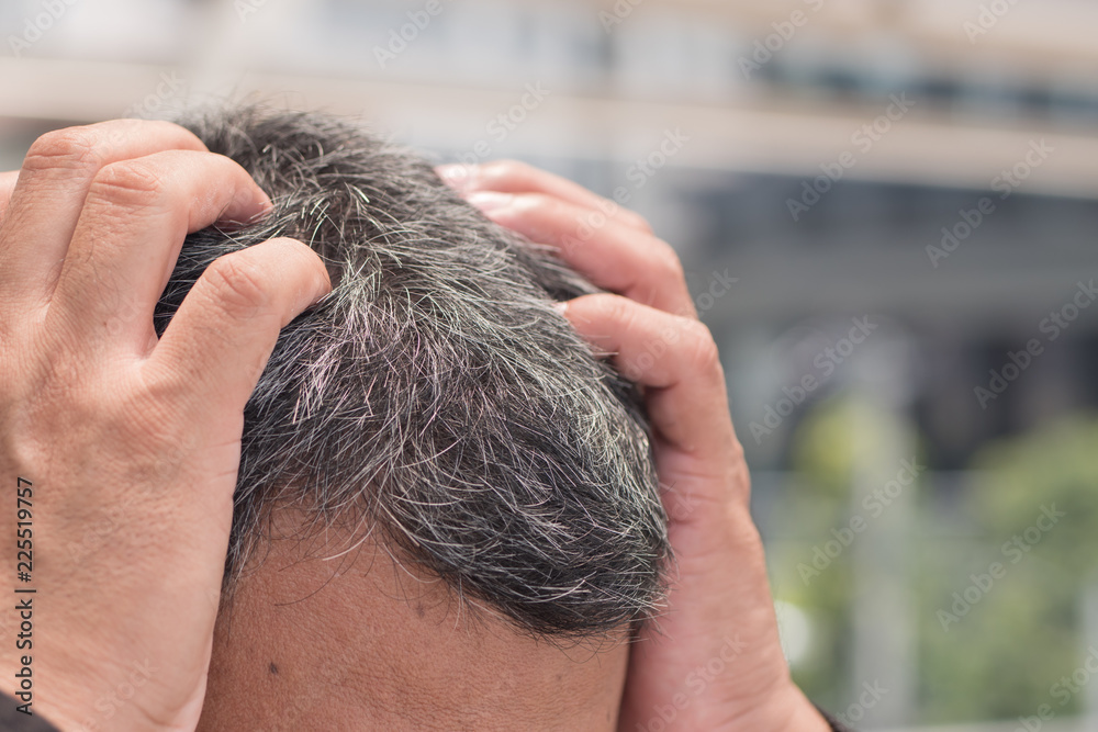 old asian senior man head with grey hair; head portrait of unhappy, aging,  old asian senior