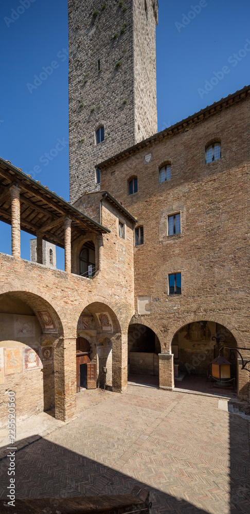 San Gimignano Italy July 2nd 2015 : Entrance and courtyard to the Musei Civici in San Gimignano, Tuscany, Italy