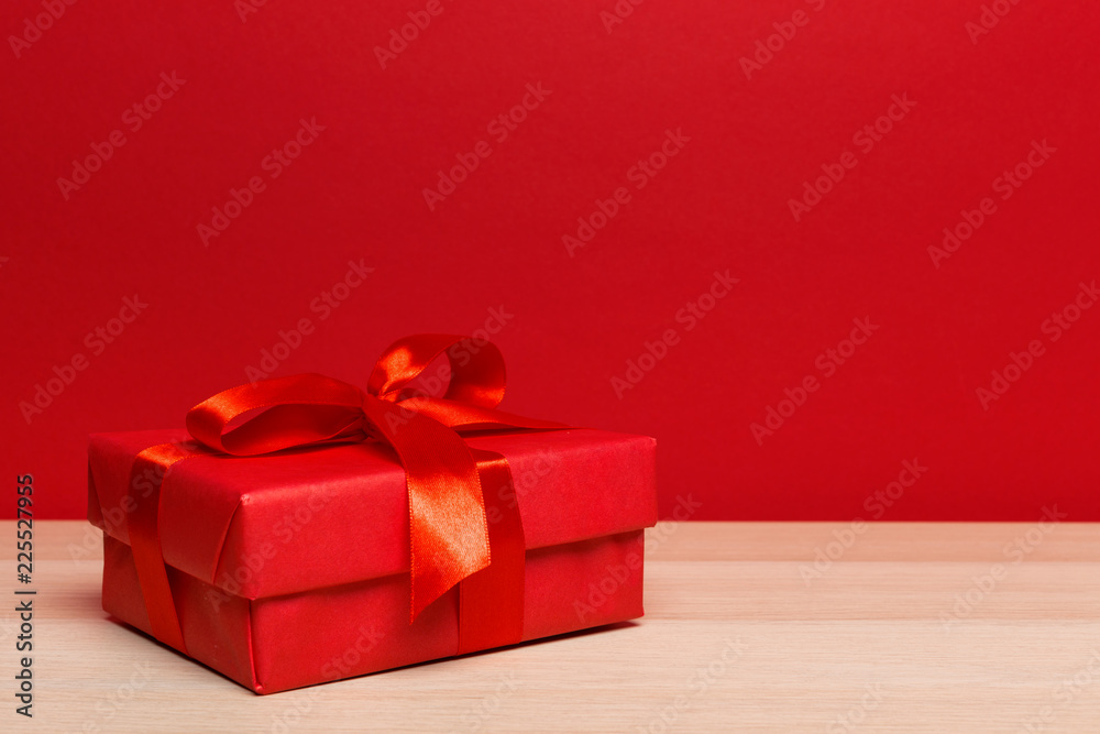 Fototapeta premium Christmas gift box on tablet
