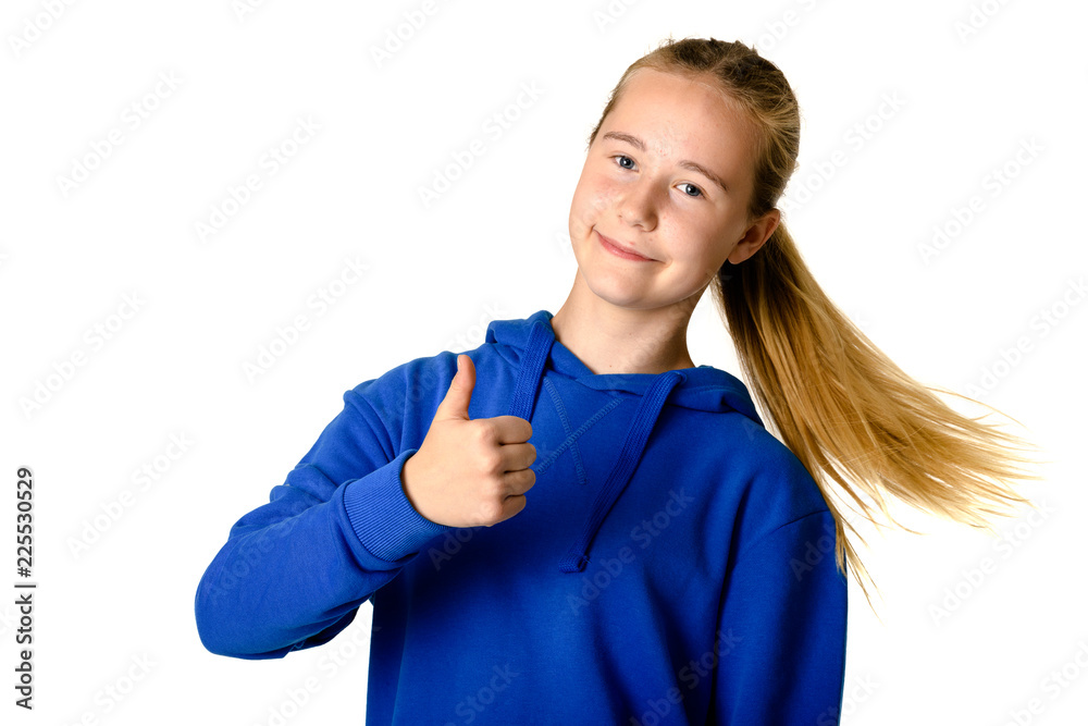 Young teen girl on white background showing thumbs up Young teen girl on white background showing thumbs up