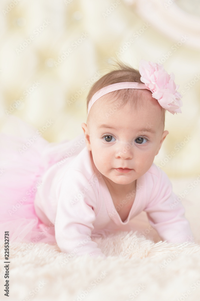 Portrait of cute charming girl in pink dress Portrait of cute charming girl in pink dress