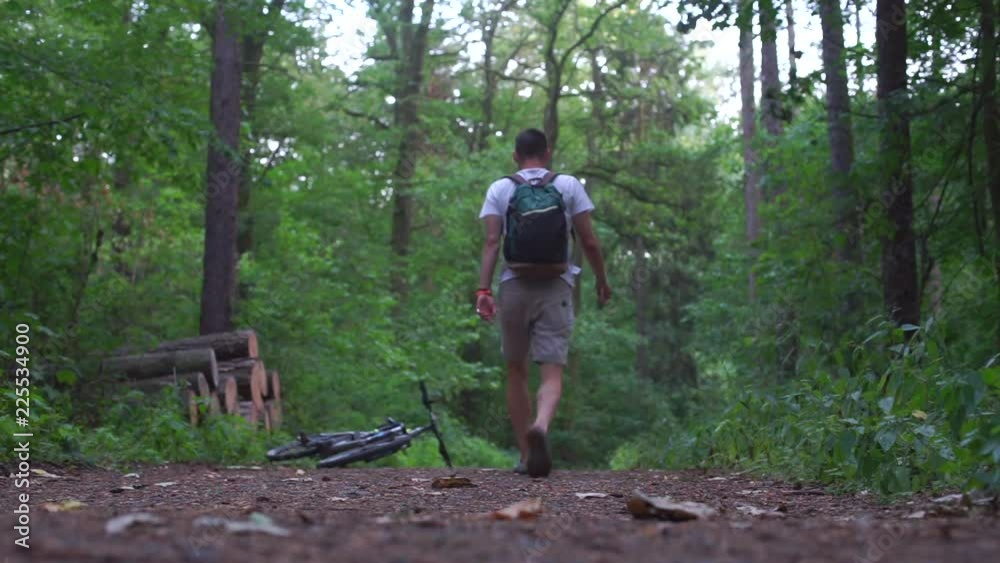 Self-isolation, quarantine of viral infection COVID 19. Healthy lifestyle. The guy comes to take the bike and goes to the distance. Self-isolation, quarantine of viral infection COVID 19. Healthy lifestyle. The guy comes to take the bike and goes to the distance.