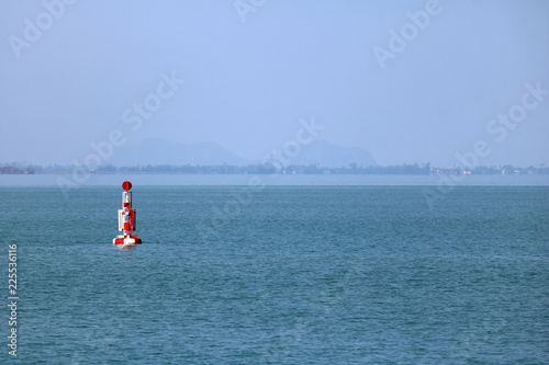 Red buoy Navigation or lateral Marks floating in the sea