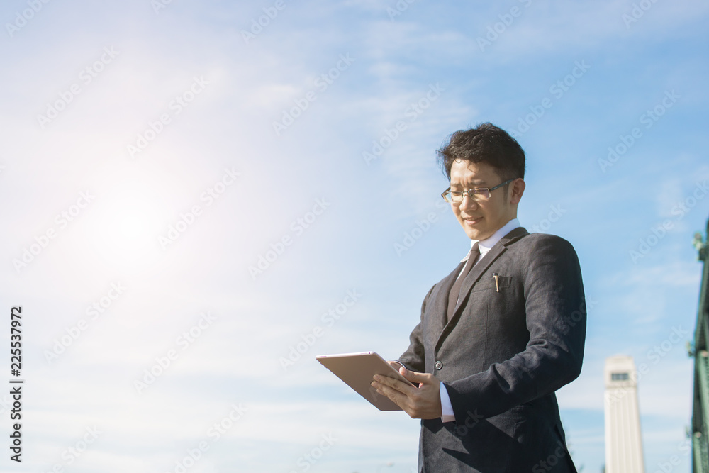 business man use tablet for connection and internet about business, technology concept business man use tablet for connection and internet about business, technology concept