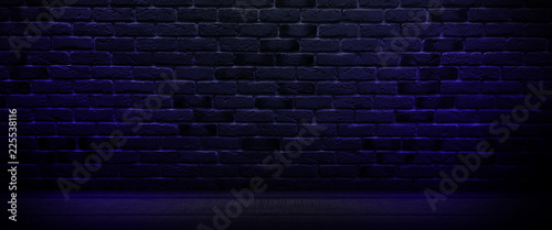 Background of an empty dark-black room. Empty brick walls  lights  smoke  glow  rays