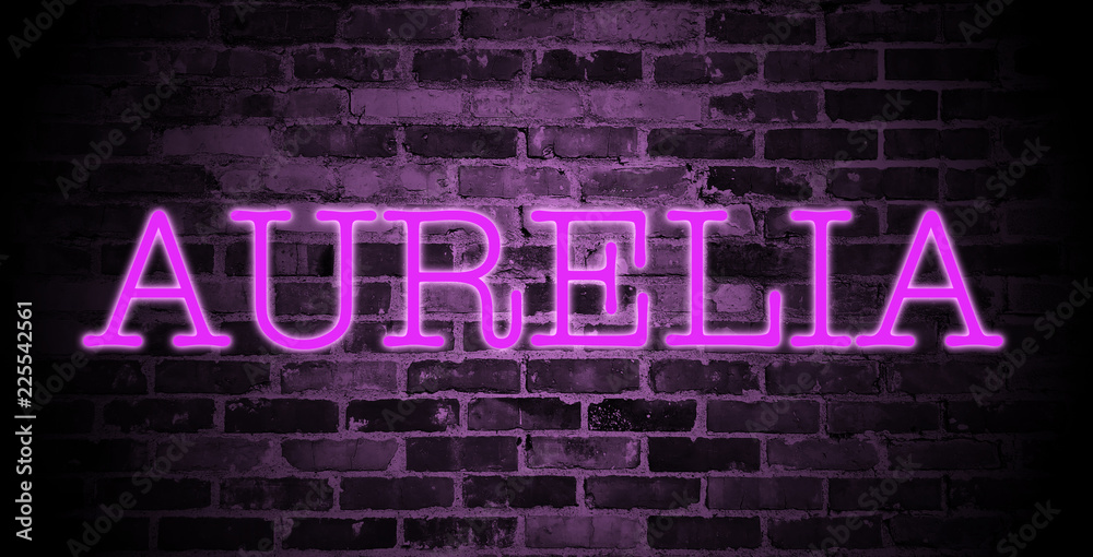 first name Aurelia in pink neon on brick wall first name Aurelia in pink neon on brick wall