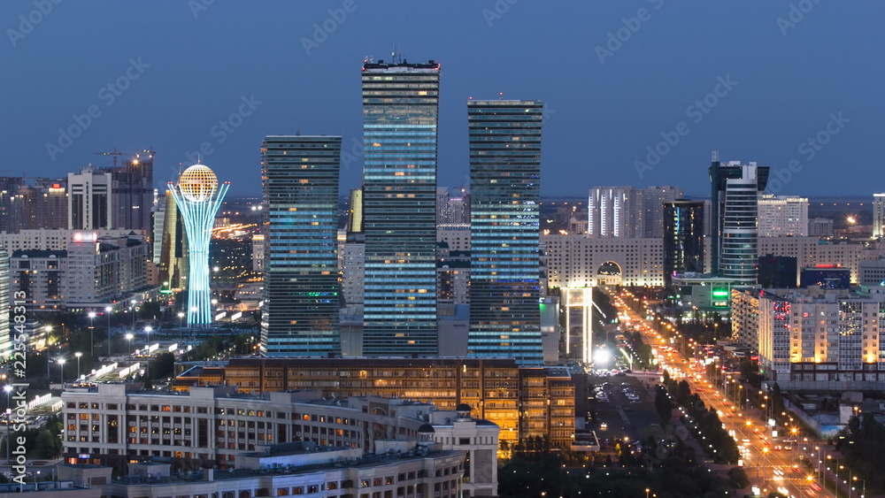 Elevated view over the city center and central business district day to night Timelapse, Central Asia, Kazakhstan, Astana