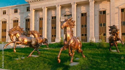 Beautiful sculptures of horses timelapse hyperlapse in front of Astana Opera Theater © neiezhmakov