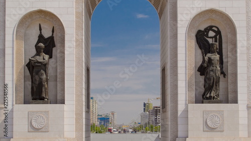 triumphal arch timelapse and the central part of the city in Astana, Kazakhstan. photo