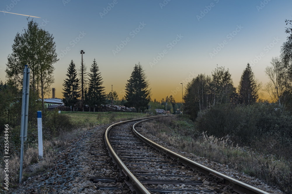 Fototapeta premium Railroad track near Zbytiny station in sunset time
