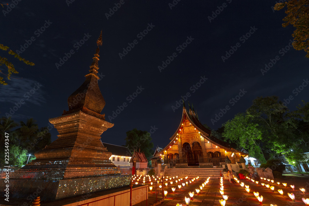 Fototapeta premium Wat Xiengthong during the end of Buddhist lent in Luang Prabang, Laos.