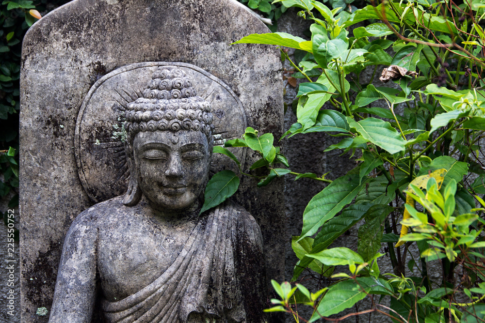 Fototapeta premium Buddhist statue in garden