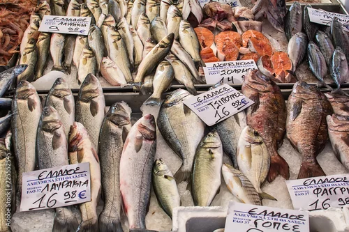 Fototapeta na wymiar Asprovalta, Greece - August 13, 2018: Selling fresh fish and squid on public market