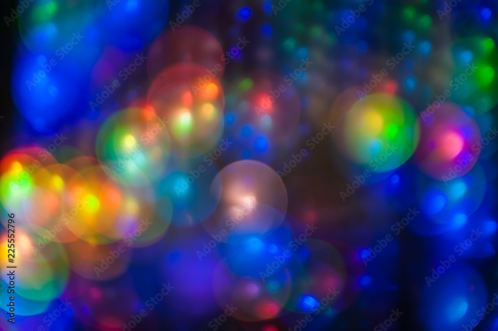 Light painting abstract background. Light painting photography, long exposure, bokeh against a black background. Blurred. Disco motion background. Multiple exposure..