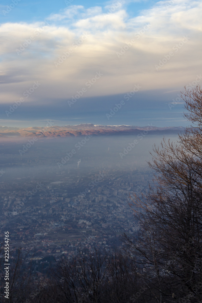 Misty elevated winter view over Sofia - the capital of Bulgaria from Kopitoto Hill at Vitosha Mountain
