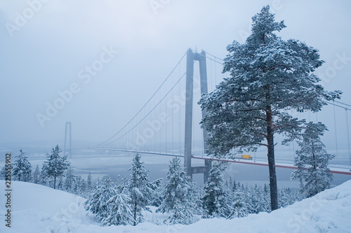 View at Hoga kusten bridge in winter in Sweden.