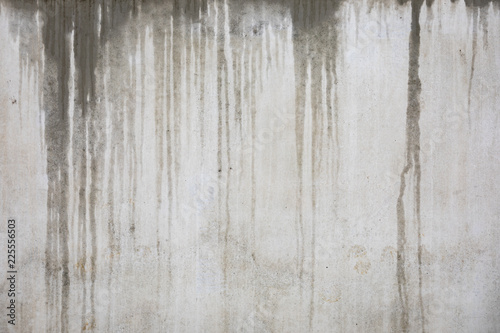 Wet concrete wall at rainy day