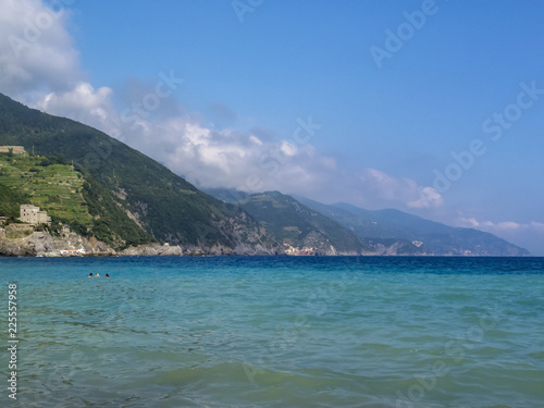 Blue Mediterranean Sea view with cliffs and mountain hills at Monterosso al Mare  Cinque Terre  Italy