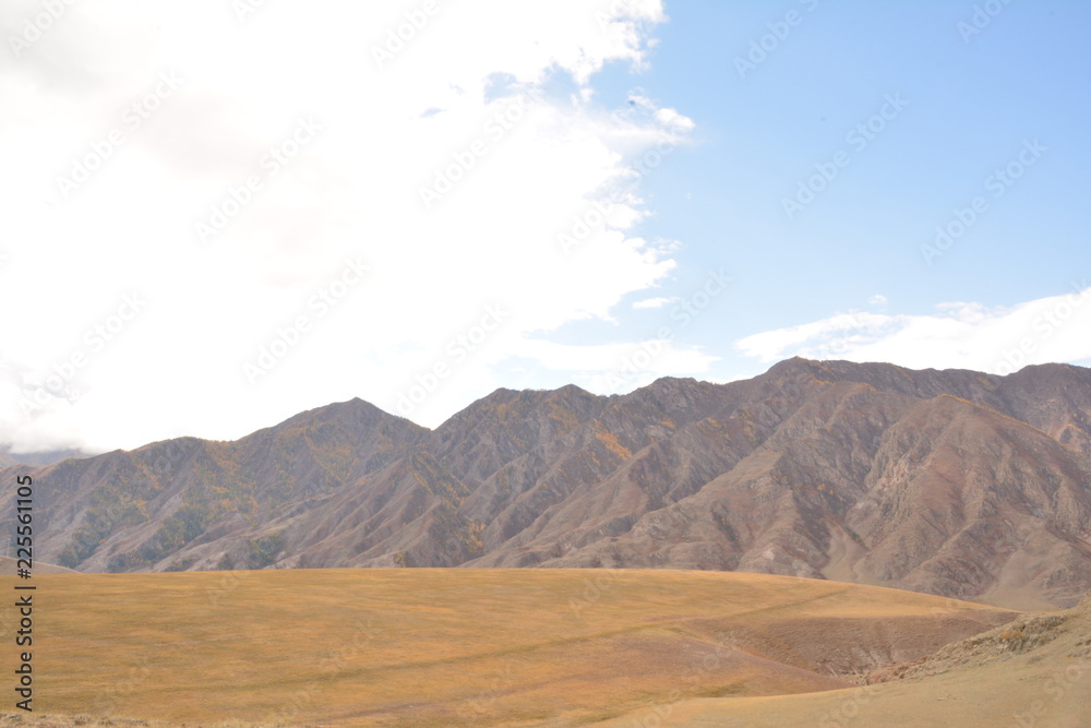mountains landscape nature landscape view sky air oxygen autumn season grass trees blue yellow sand stone gray brown ridge water river rocks rock blue Altai Russia open space mountains landscape nature landscape view sky air oxygen autumn season grass trees blue yellow sand stone gray brown ridge water river rocks rock blue Altai Russia open space