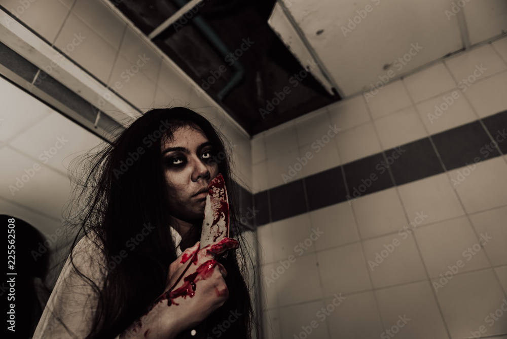Portrait of asian woman make up ghost face,Horror scene,Scary background,Halloween poster Portrait of asian woman make up ghost face,Horror scene,Scary background,Halloween poster