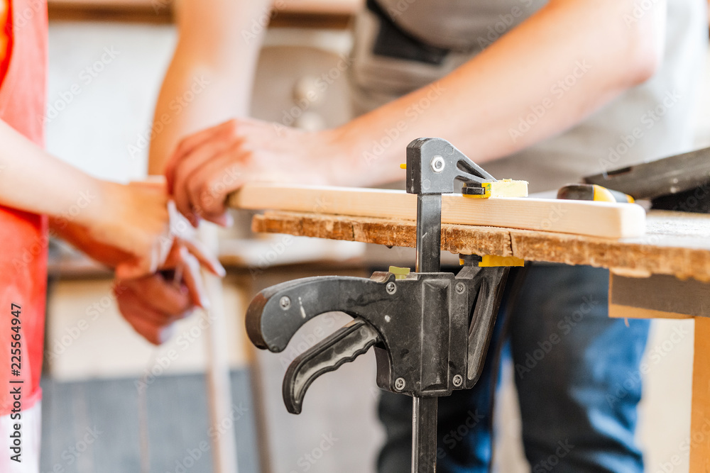 carpenter working with wood, close up on hands carpenter working with wood, close up on hands