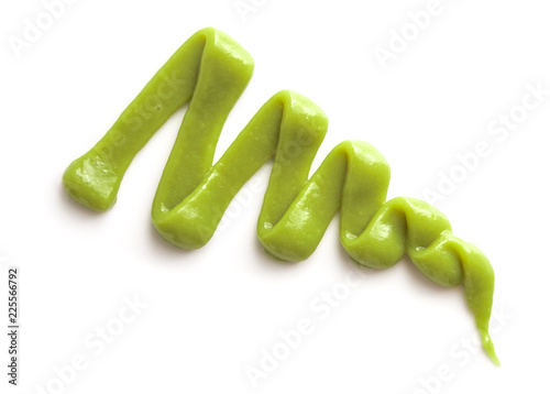 Photo Green wasabi sauce isolated on white background,top view
