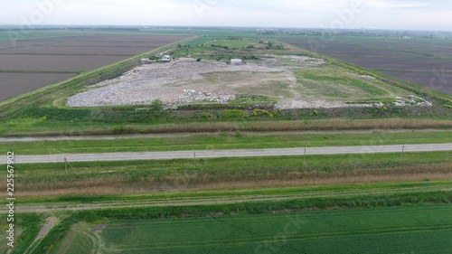 garbage dump with heap of rubbish. Landfill of garbage outside the village. photo