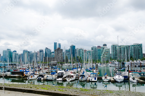 Boats at Coal Harbor Marina and surrounding residential towers in Vancouver, British Columbia, Canada © Marieke