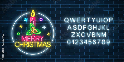 Glowing neon christmas sign with holly, xmas candle and alphabet. Christmas symbol web banner in neon style.