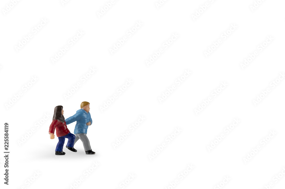 Isolated on white background image of miniature kids running. Clipping Path of the model included. Copy space.