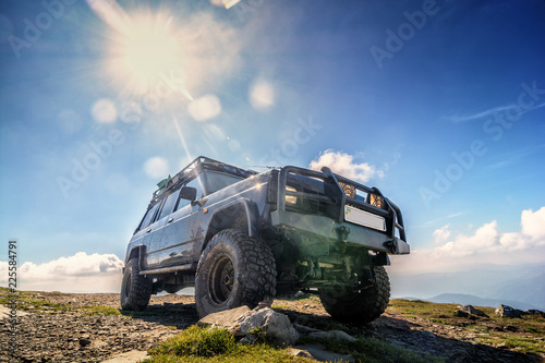 Jeep car adventure on top of Mountain Petros in the Ukrainian Carpathians photo