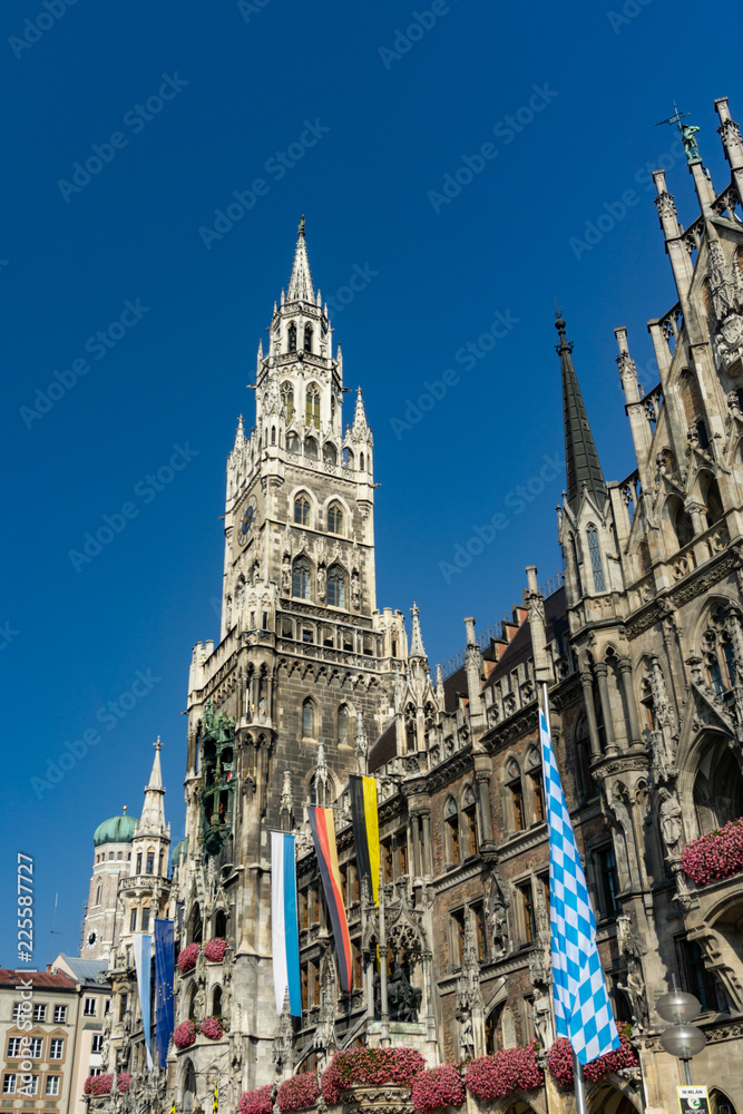 The clock tower of the new City Hall (Rathaus) in Marienplatz is a famous building in Gothic architecture - Munich, Bavaria, Germany, Europe